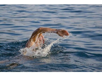 Open Water Swimming Tips: Mastering Breathing, Position, and Wetsuits for Triathlon Success