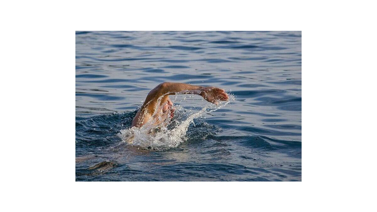 Open Water Swimming Tips: Mastering Breathing, Position, and Wetsuits for Triathlon Success